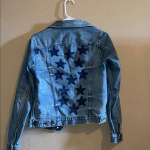 Blue jean jacket with stars on back